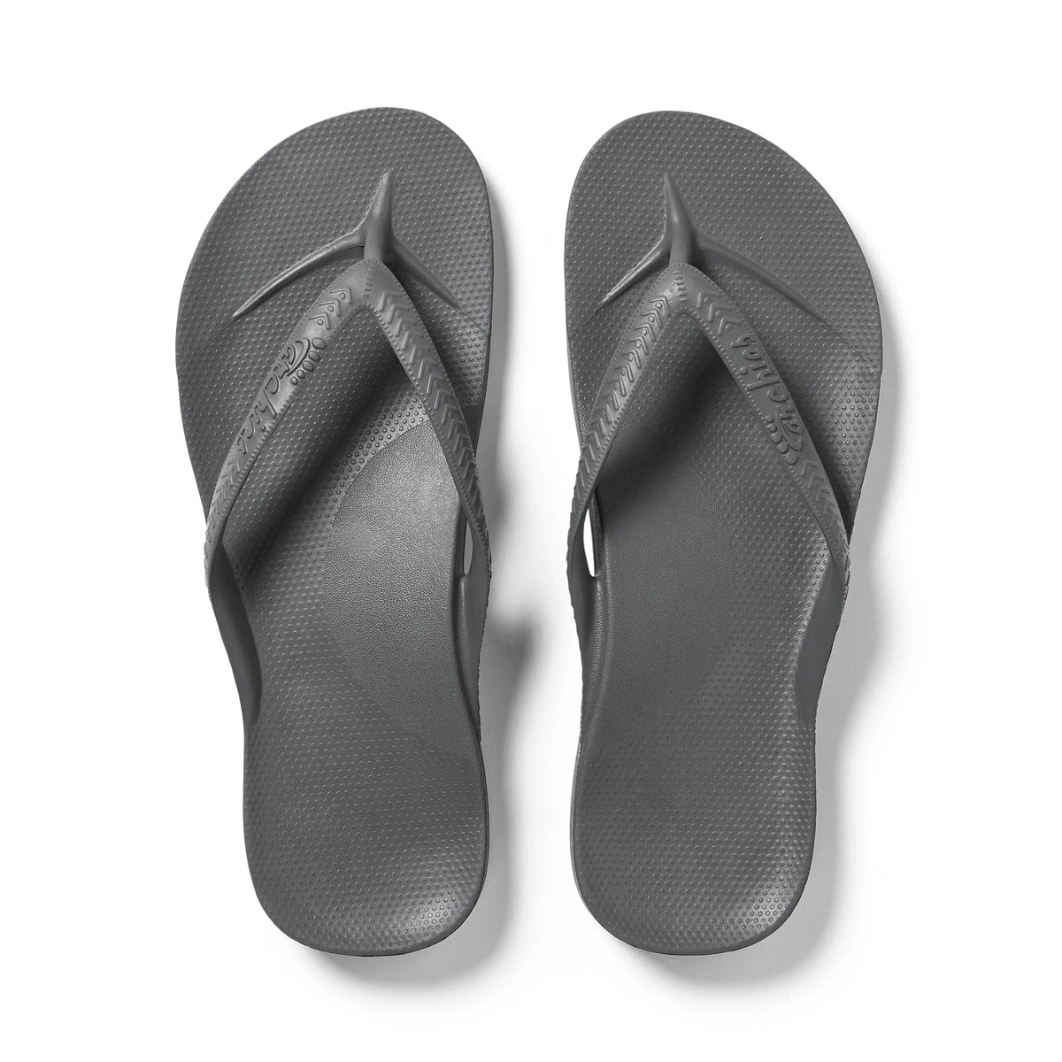 Archies Arch Support Flip Flops in charcoal grey, top-down view of pair