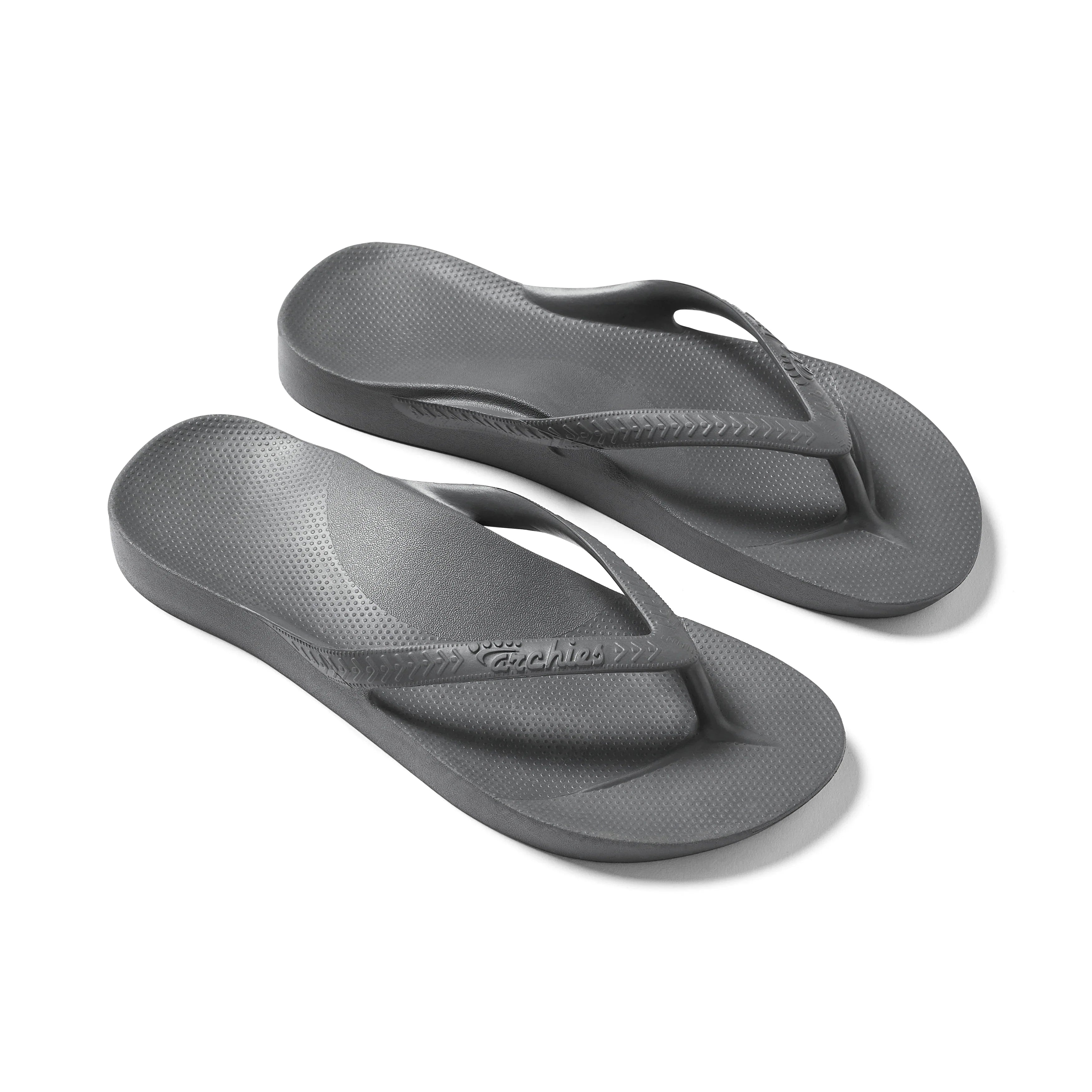 Archies arch support flip flops in charcoal grey, pair shown from above on white background
