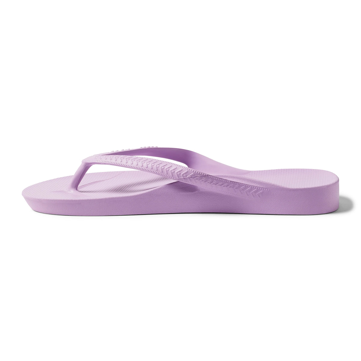 Archies Arch Support Flip Flops in lilac purple, side profile view on white background
