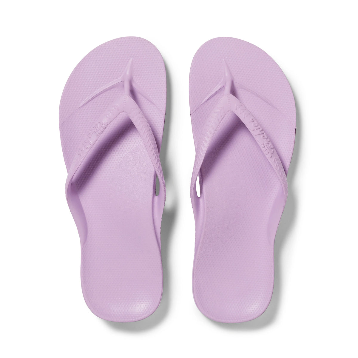 Archies arch support flip flops in lilac, shown as a pair from above on white background