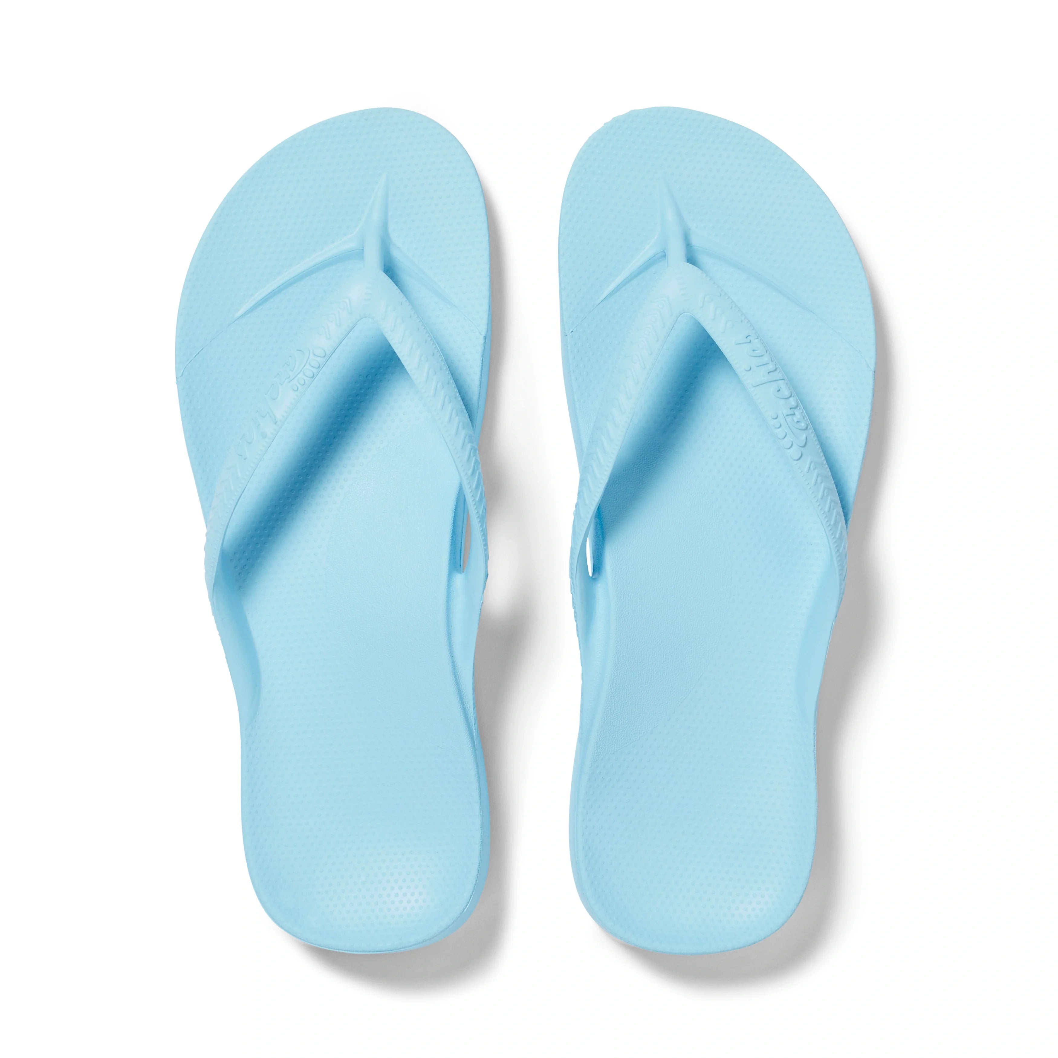 Archies Arch Support Flip Flops in sky blue, shown from above as a pair