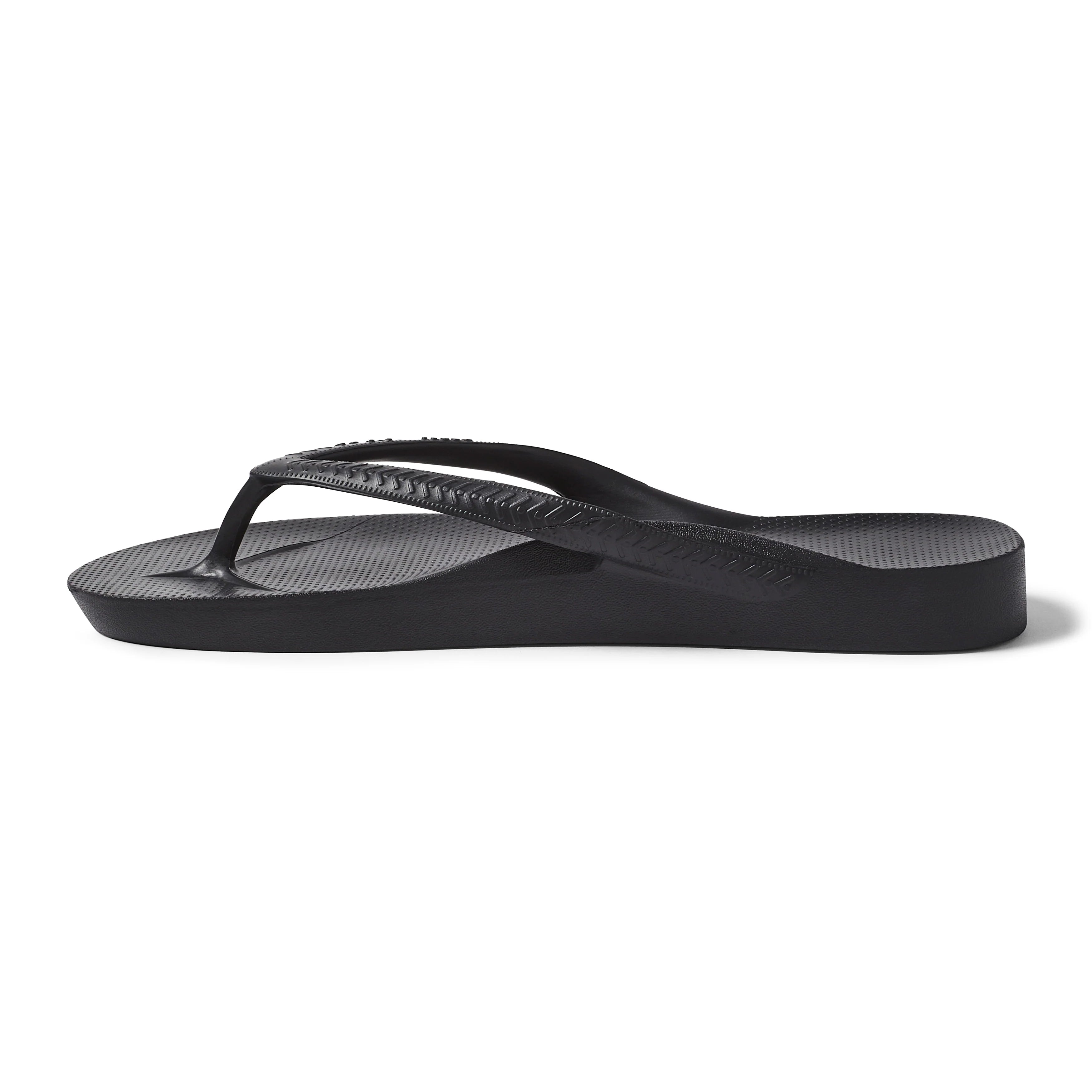 Archies black arch support flip flop shown in profile view on white background