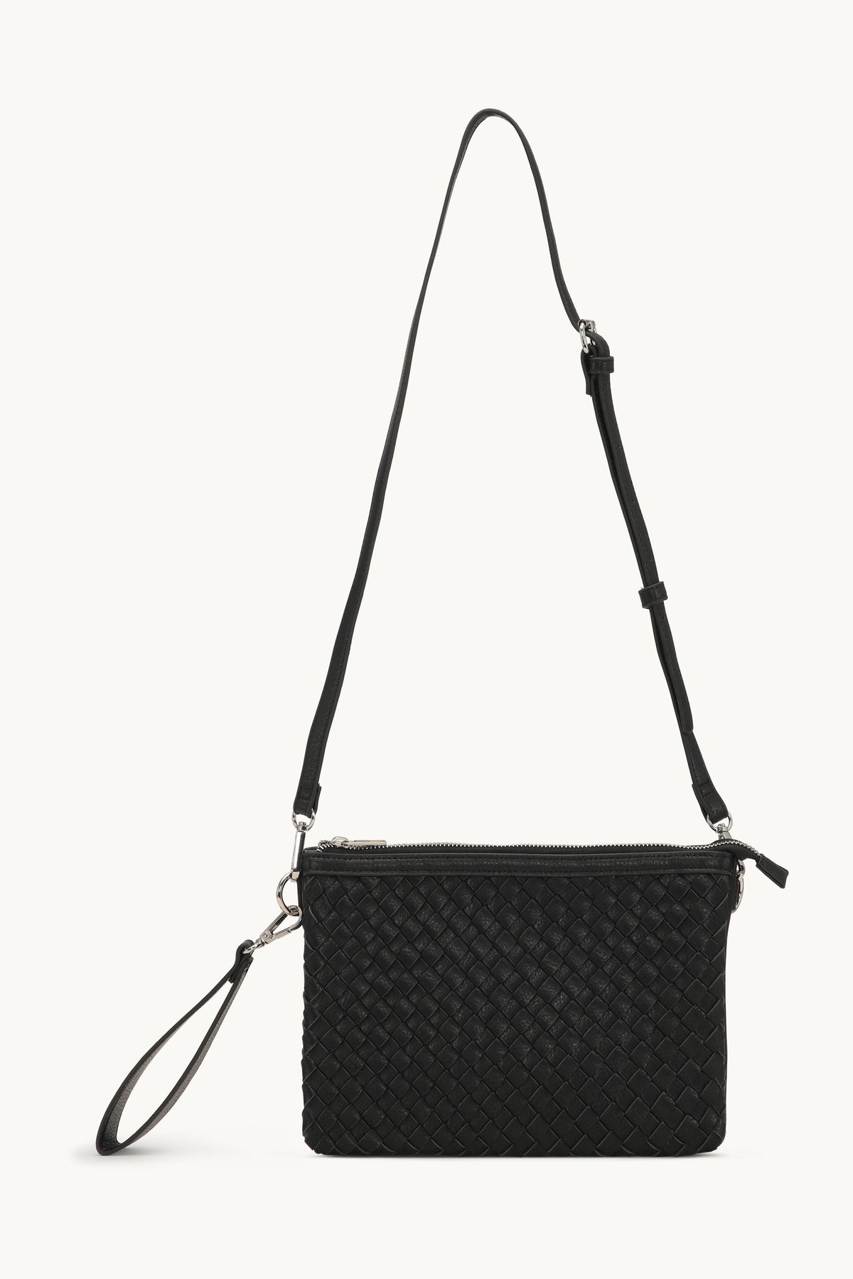 Black woven leather crossbody bag with silver zipper, adjustable strap and wristlet handle