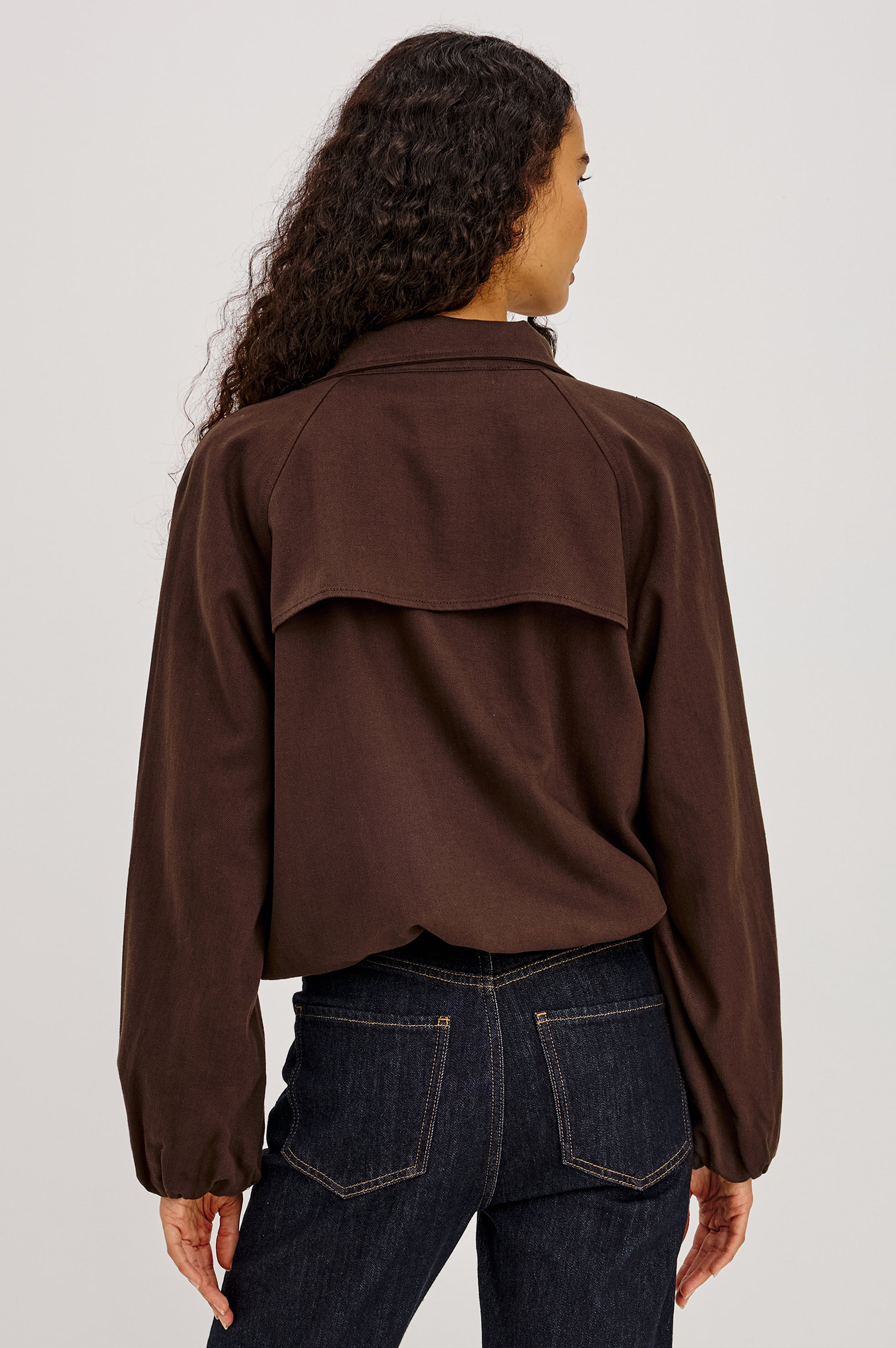 Back view of Rails Blake jacket in espresso dark brown with cape detail on model
