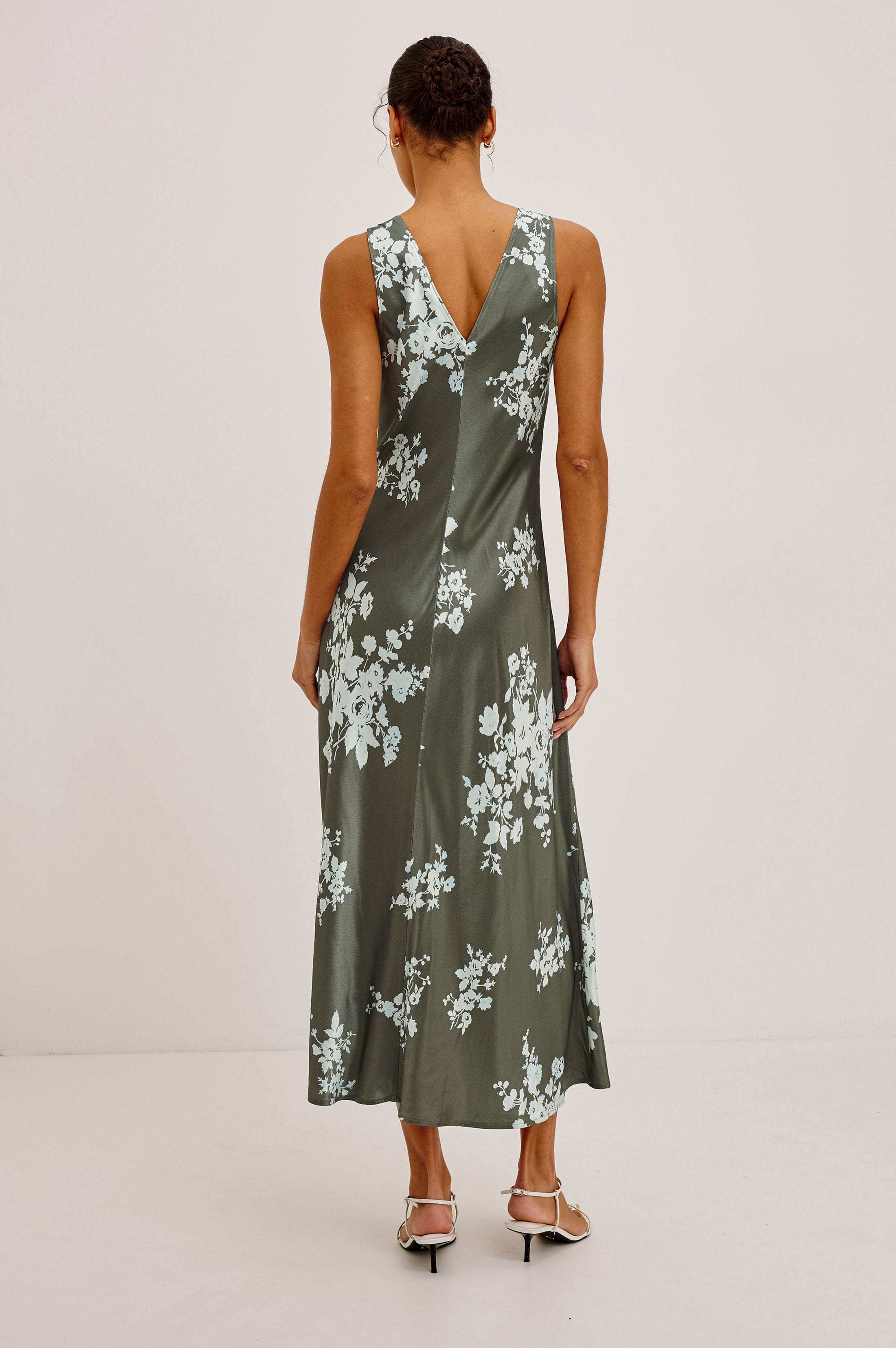 Back view of Rails Camellia midi slip dress in olive green lace floral print on model