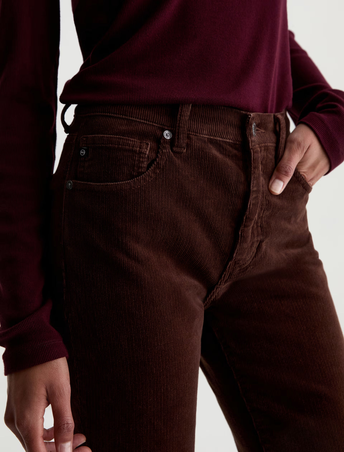 AG Brinley wood brown corduroy pants with five-pocket styling and silver button