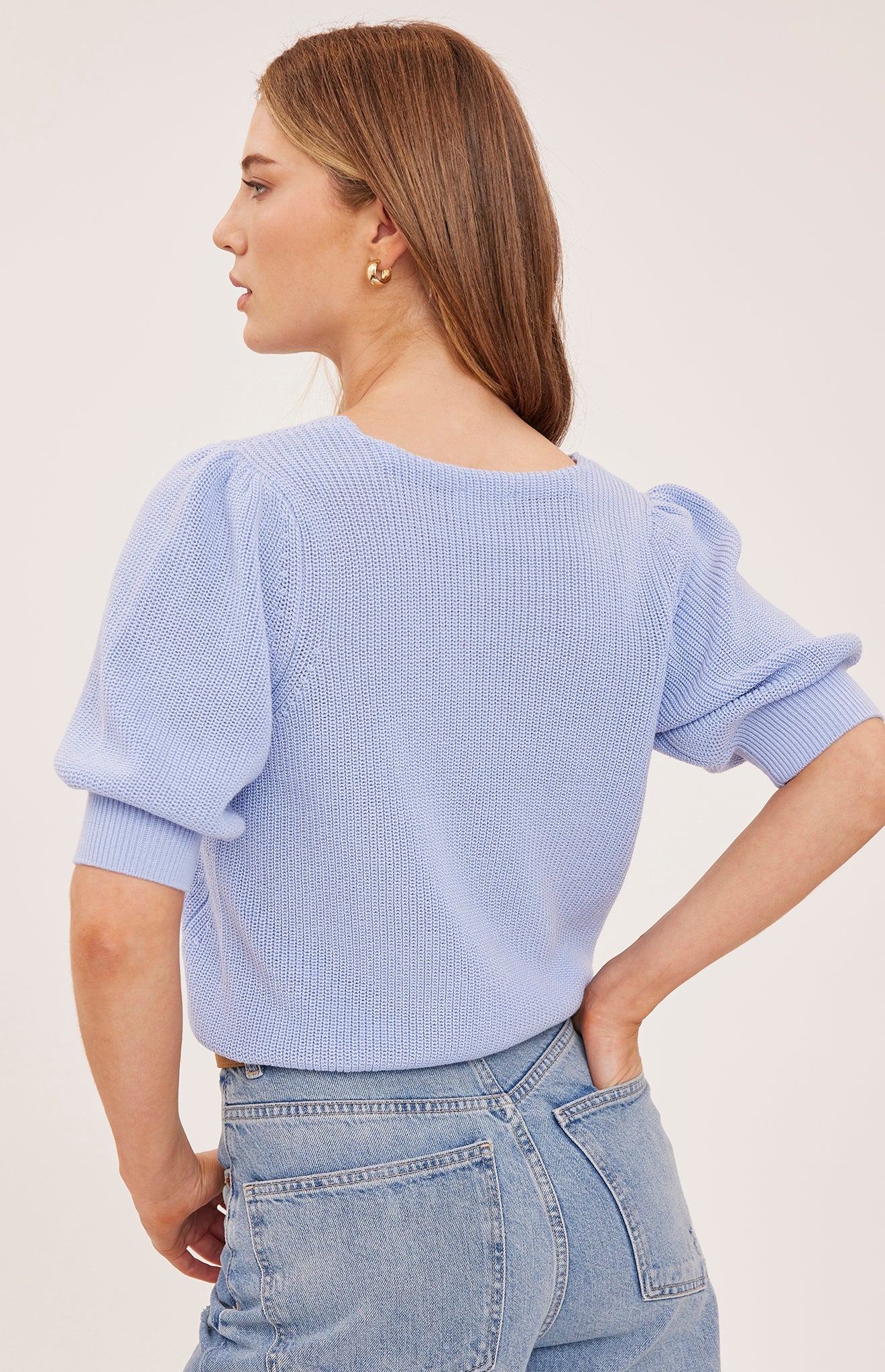 Gentle Fawn Phoebe light blue knit sweater with puff sleeves, back view