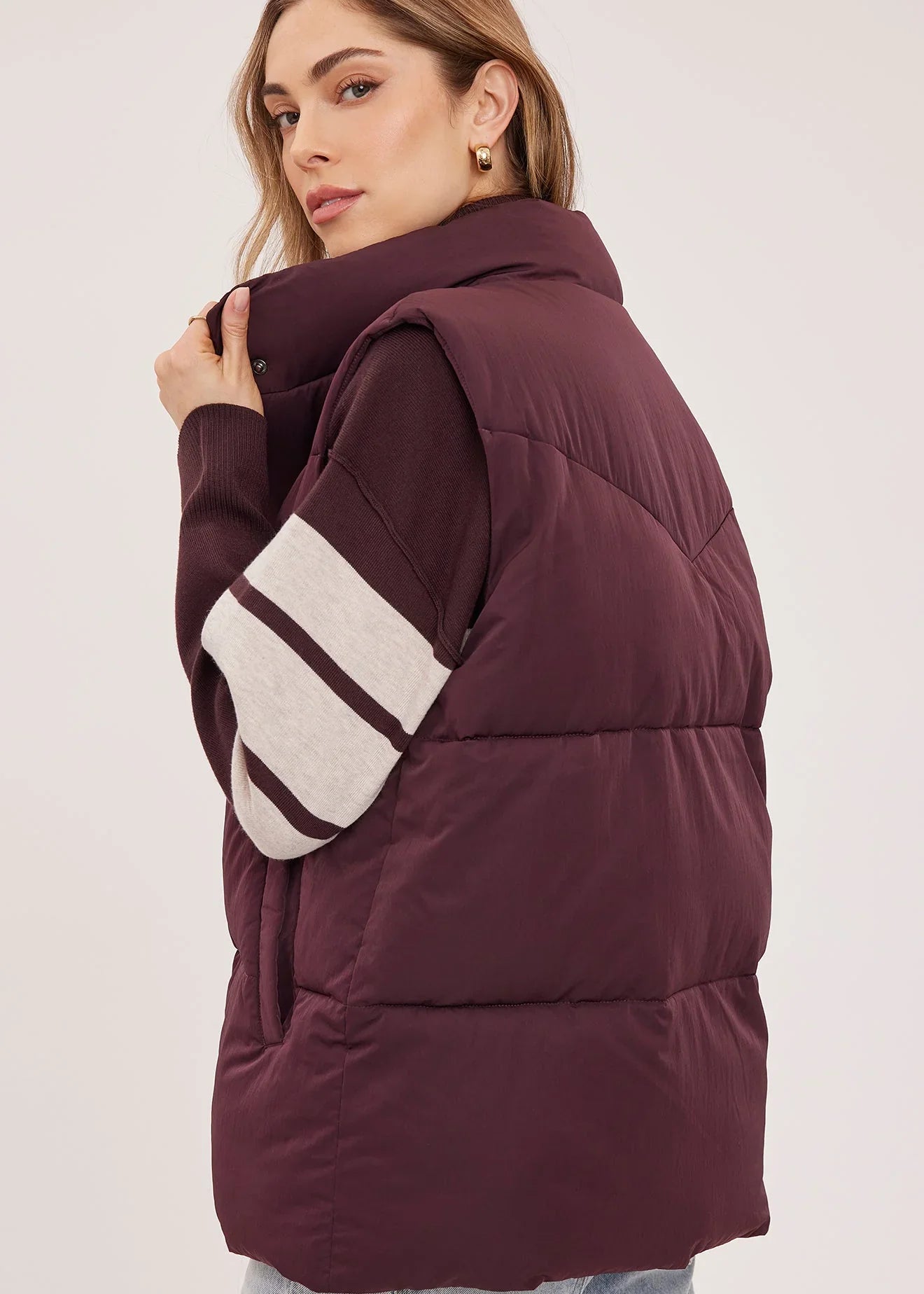 Gentle Fawn Shiloh burgundy quilted puffer vest with high collar, side view