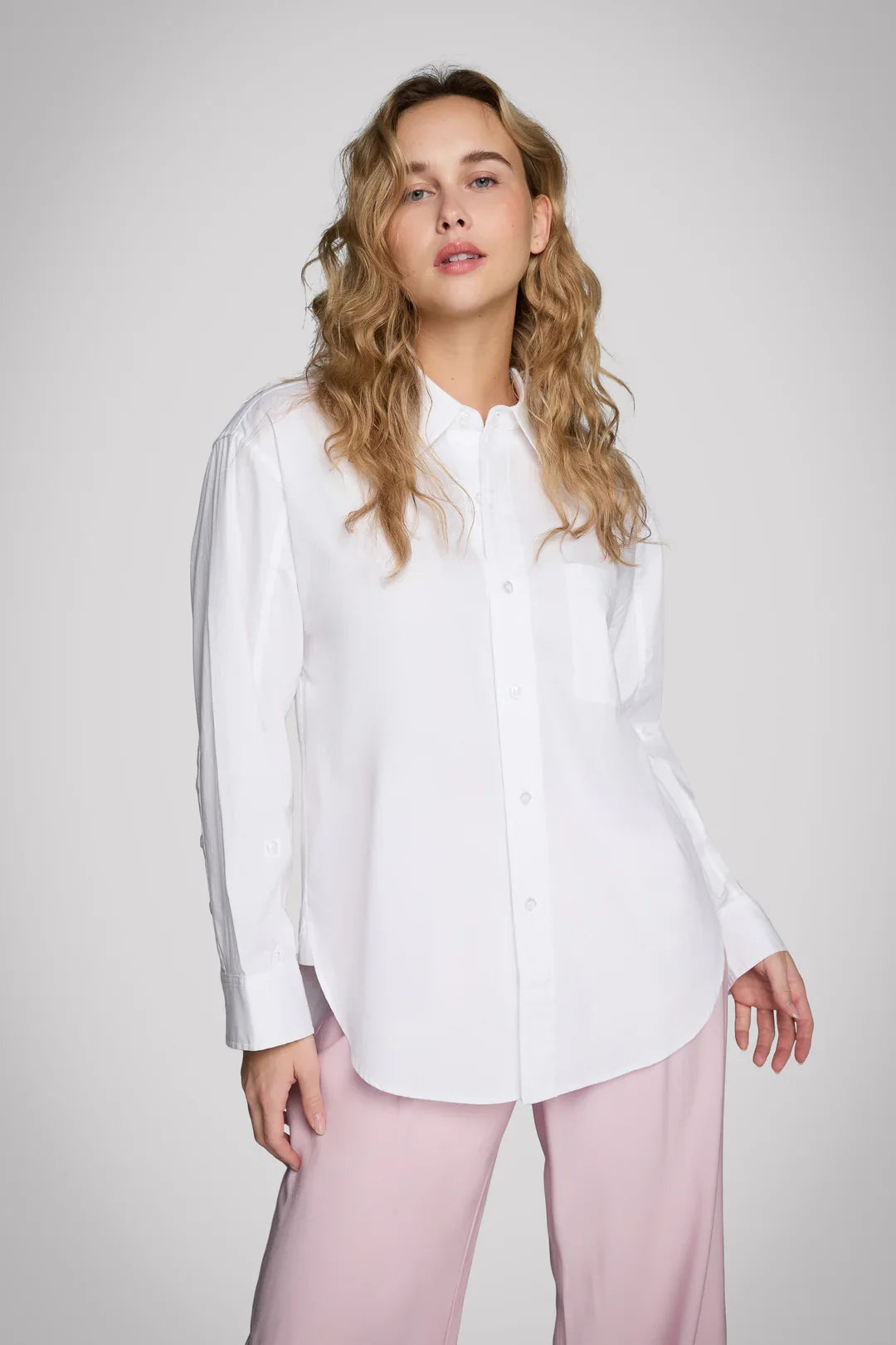 Pure & Simple white oversized button-up shirt with long sleeves and chest pocket