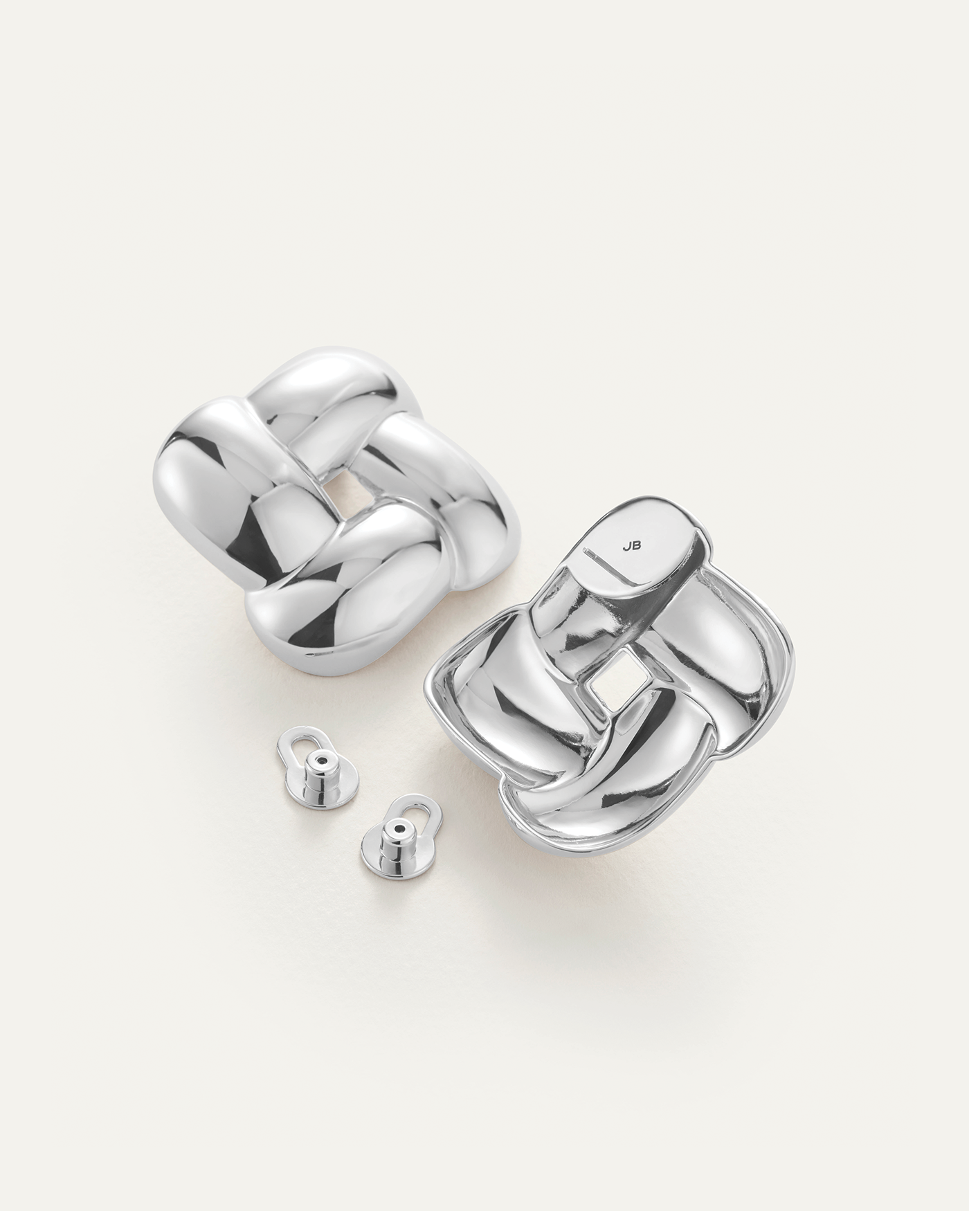 Jenny Bird Gio silver chunky braided link stud earrings shown front and back with earring backs