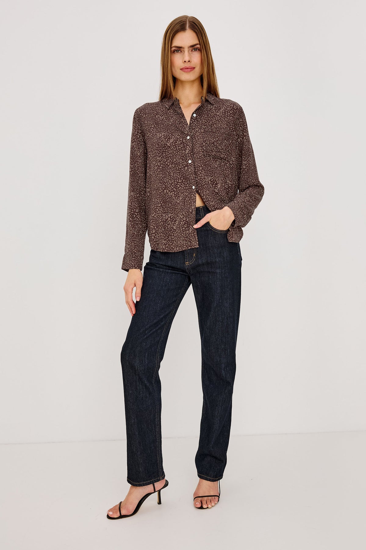 Model wearing Rails Josephine shirt in cocoa mini cheetah print with dark wash straight jeans