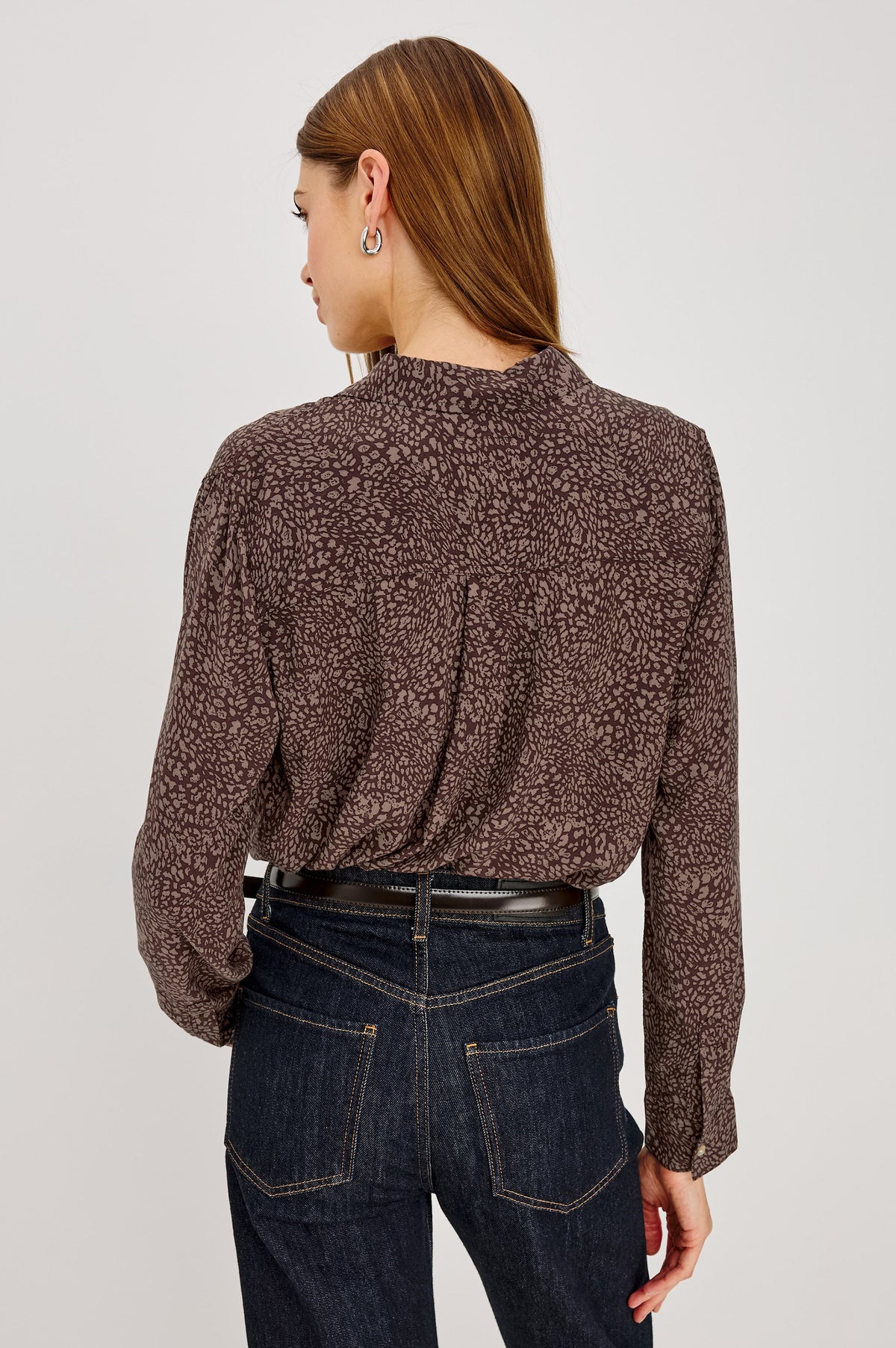 Back view of Rails Josephine blouse in cocoa mini cheetah print with dark jeans