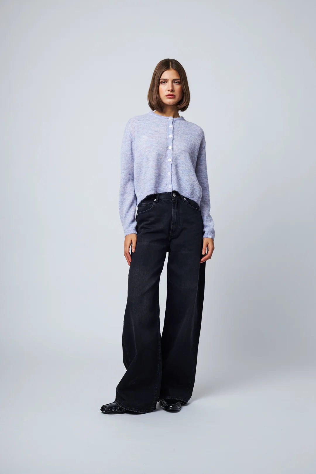 Lavender mist fuzzy button-front cardigan styled with wide-leg black jeans
