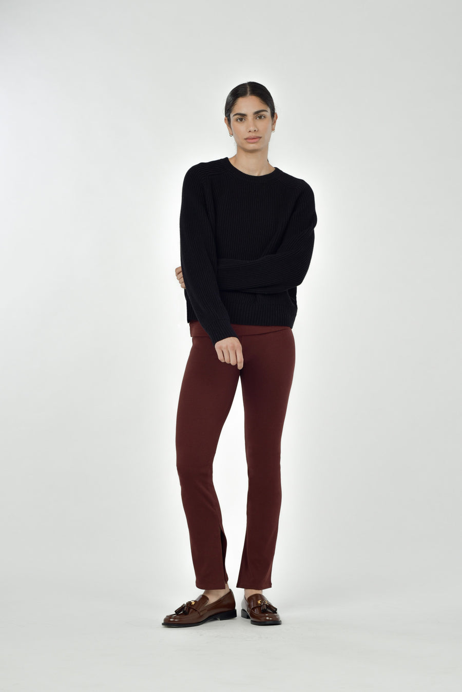 Black ribbed cotton crew neck sweater with relaxed oversized fit, long sleeves