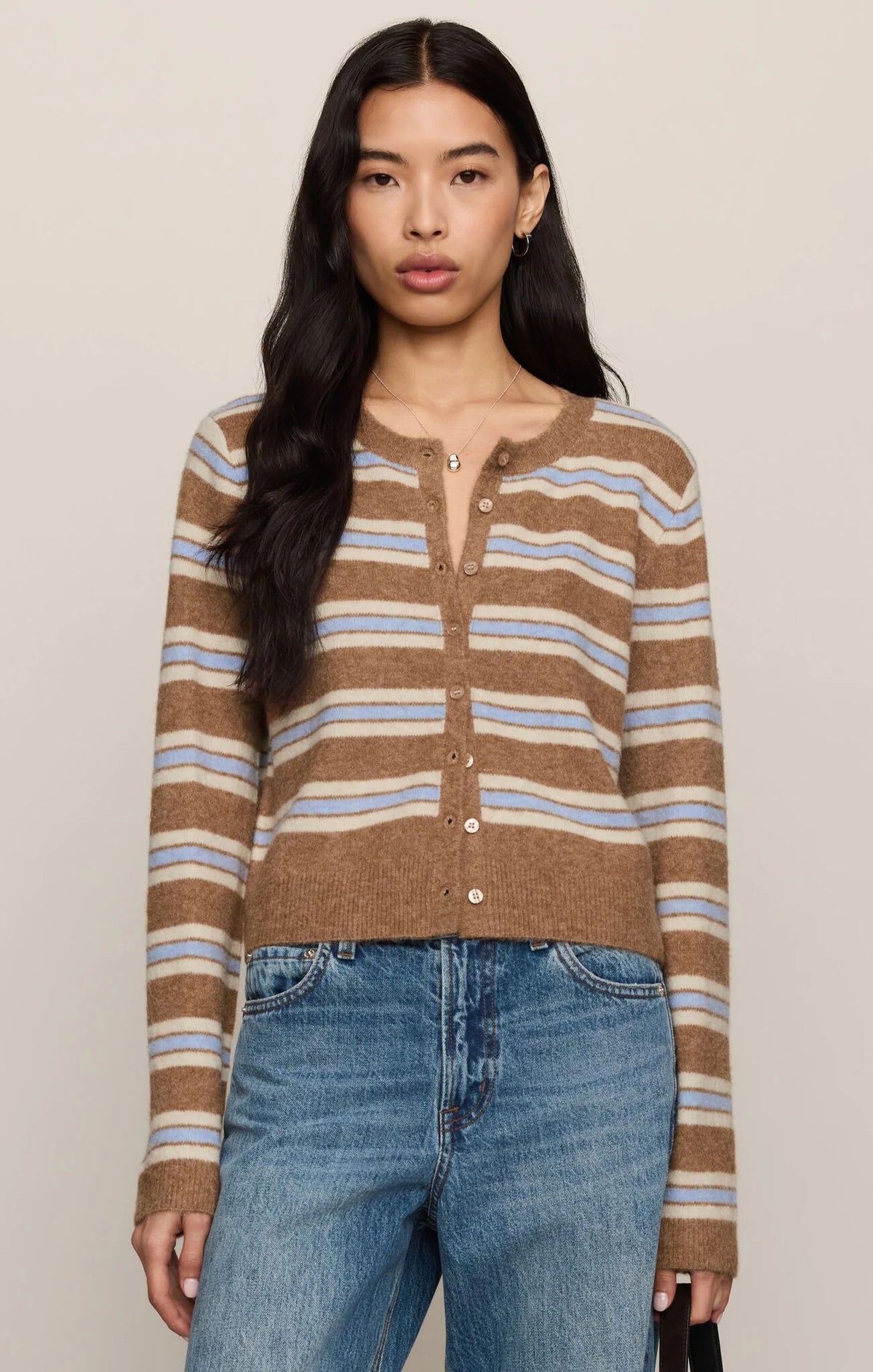 Golden caramel striped knit cardigan with blue and cream stripes and button front
