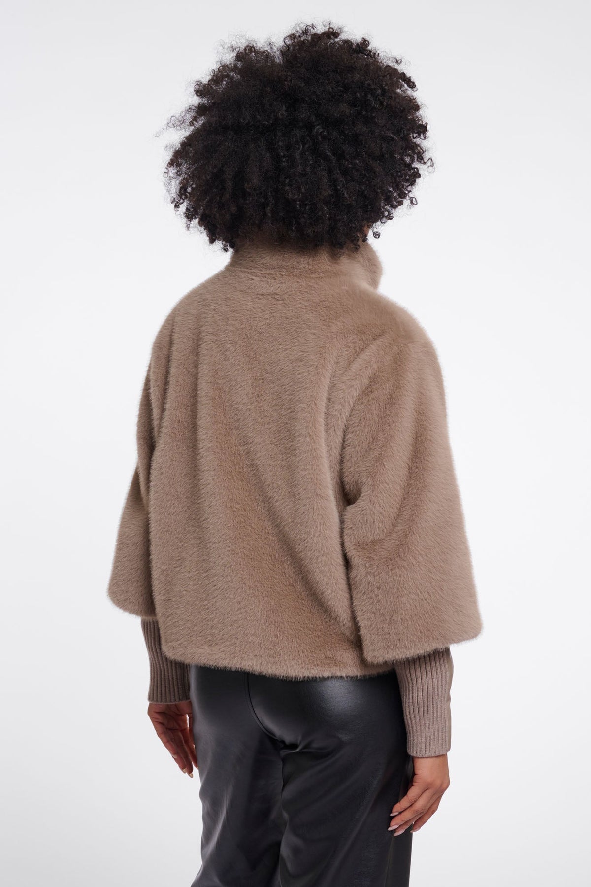 Back view of RINO & PELLE NESRIN fuzzy oversized turtleneck sweater in mocha latte