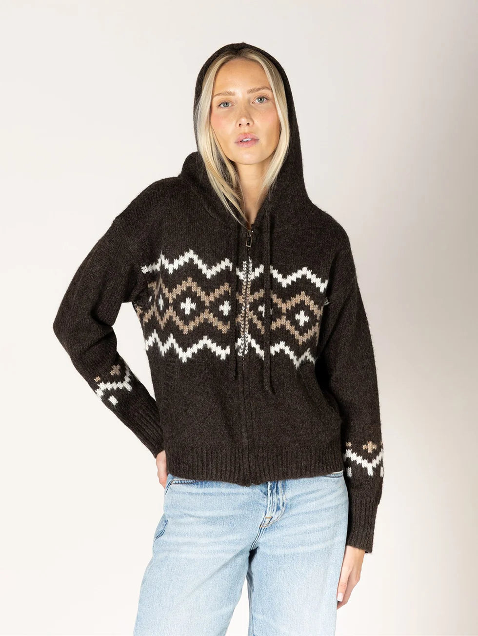 Dark brown Fair Isle zip-up hooded knit sweater with white and tan geometric pattern