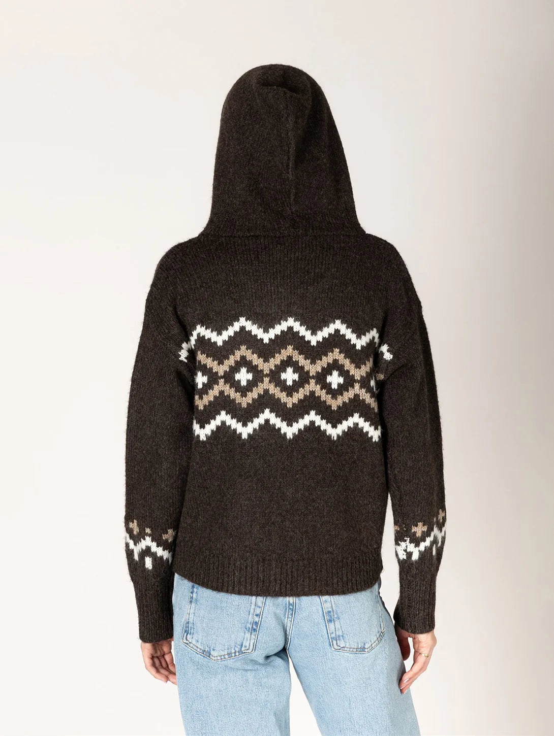 Dark brown Fair Isle hooded knit sweater with white and tan geometric pattern