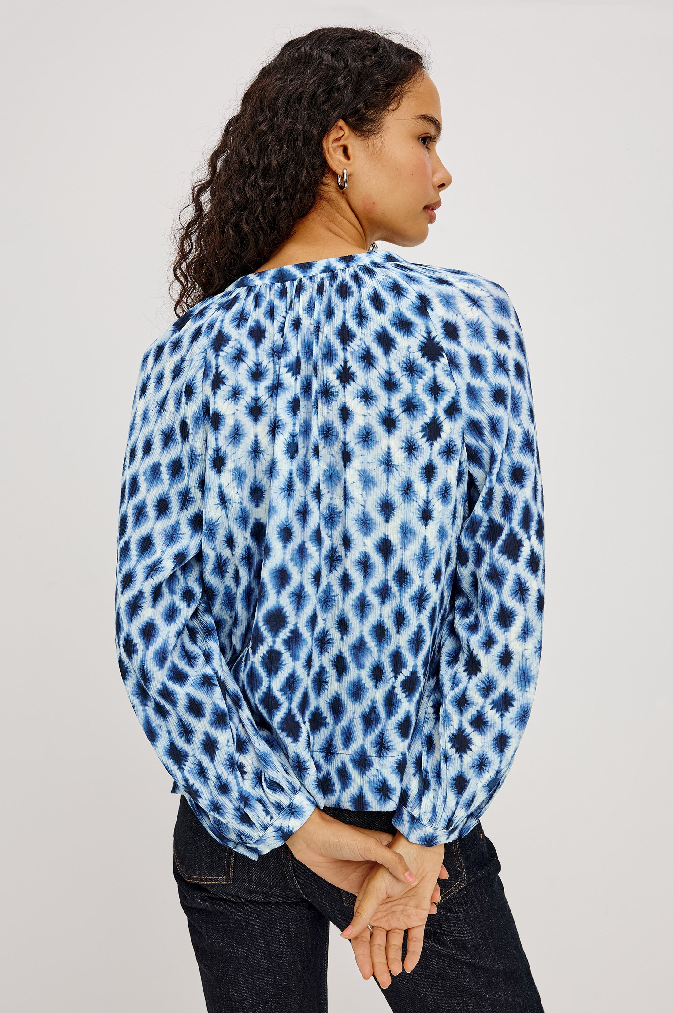 Back view of Rails Saint blouse in Sapphire Shibori blue tie-dye diamond print with long sleeves