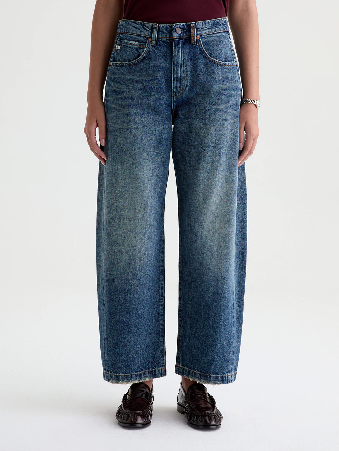 AG Hattie wide-leg barrel jeans in 10 Yrs Front Line medium blue wash on model