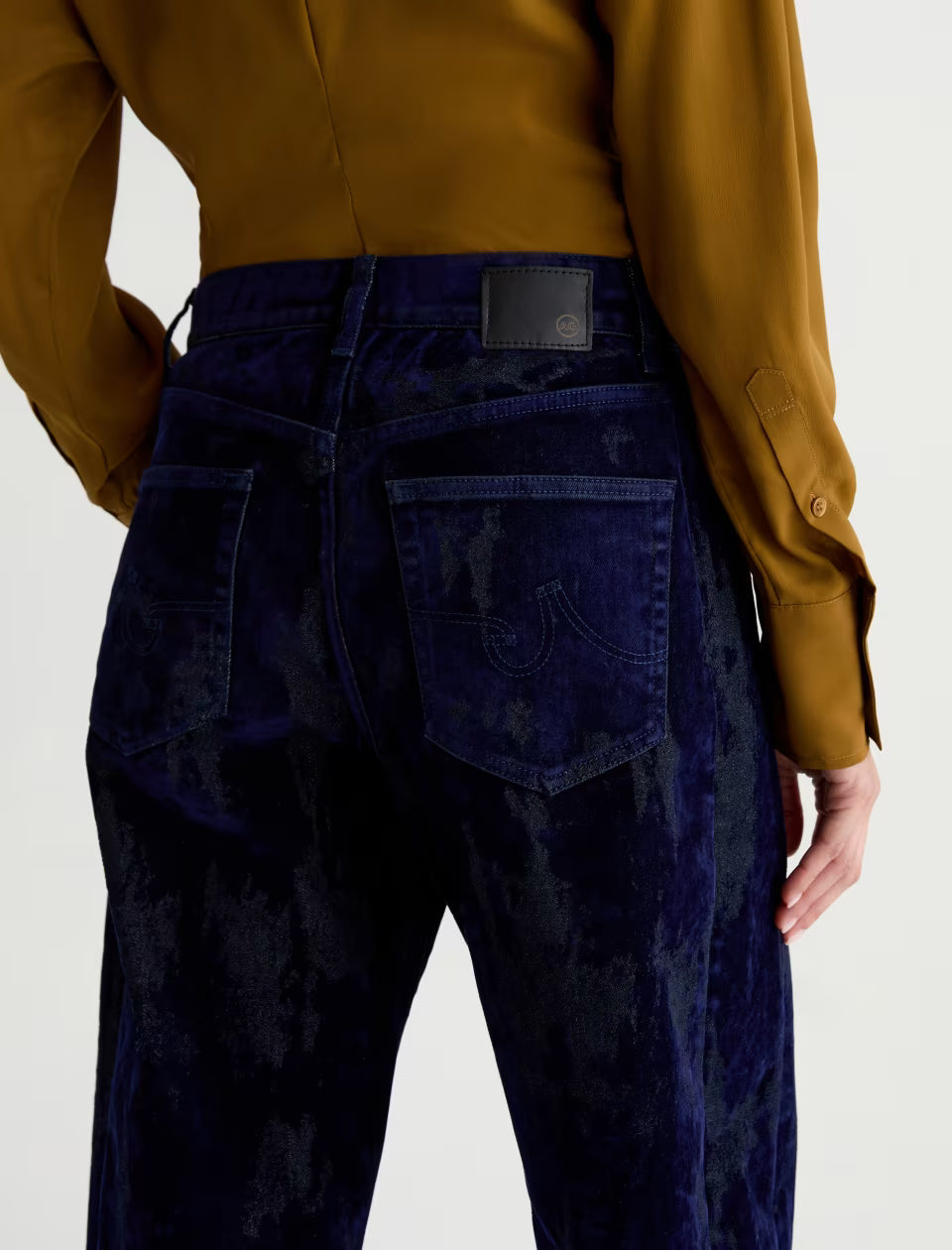 AG Hattie Ballroom navy blue velvet wide-leg jeans, back view with logo patch