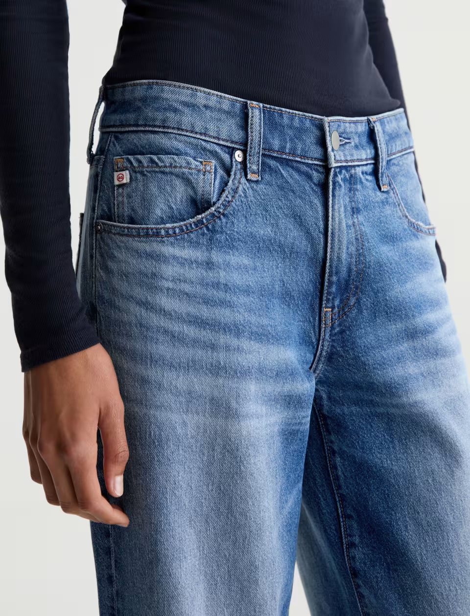 AG Adria mid-rise wide-leg blue jeans with faded wash and five-pocket styling