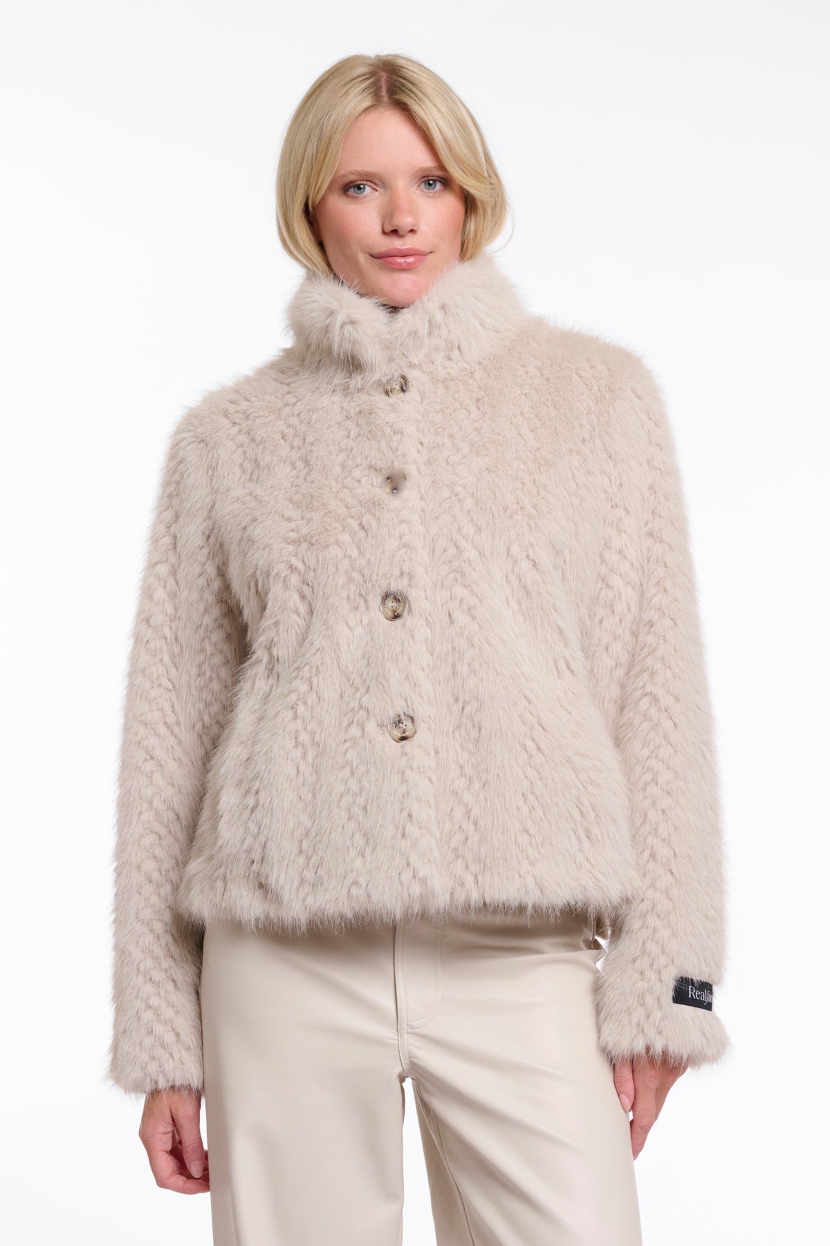 Woman wearing Rino & Pelle VIE fluffy textured jacket in birch dessin beige colorway