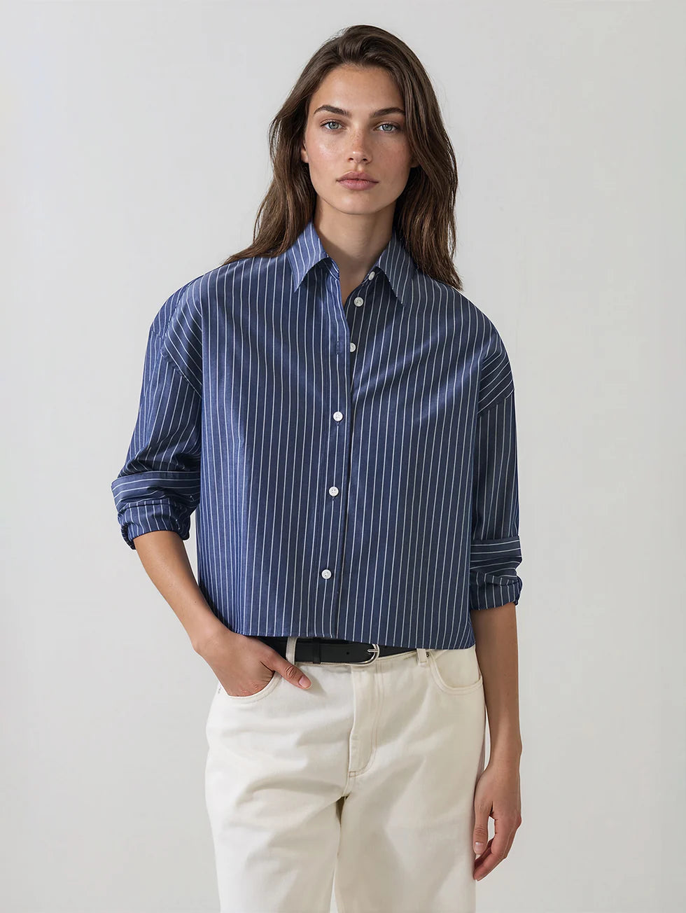 Women's navy blue pinstripe boxy cotton button-up shirt with rolled sleeves