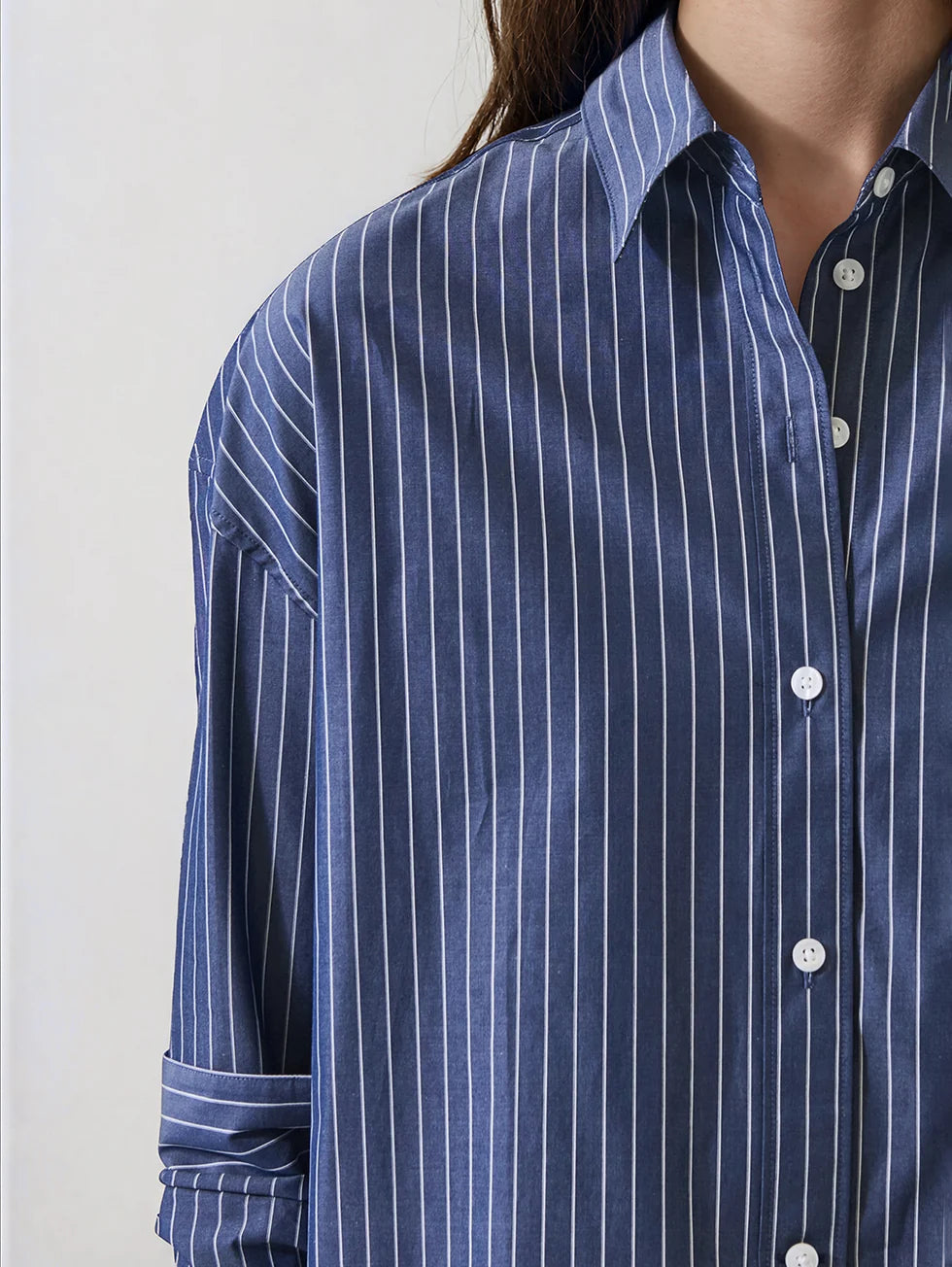 Washed navy blue striped boxy cotton button-front shirt with long sleeves