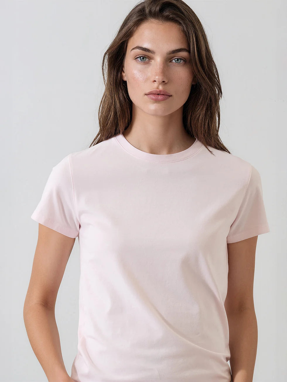 Women's fitted pale pink short sleeve crew neck t-shirt, soft minimal style