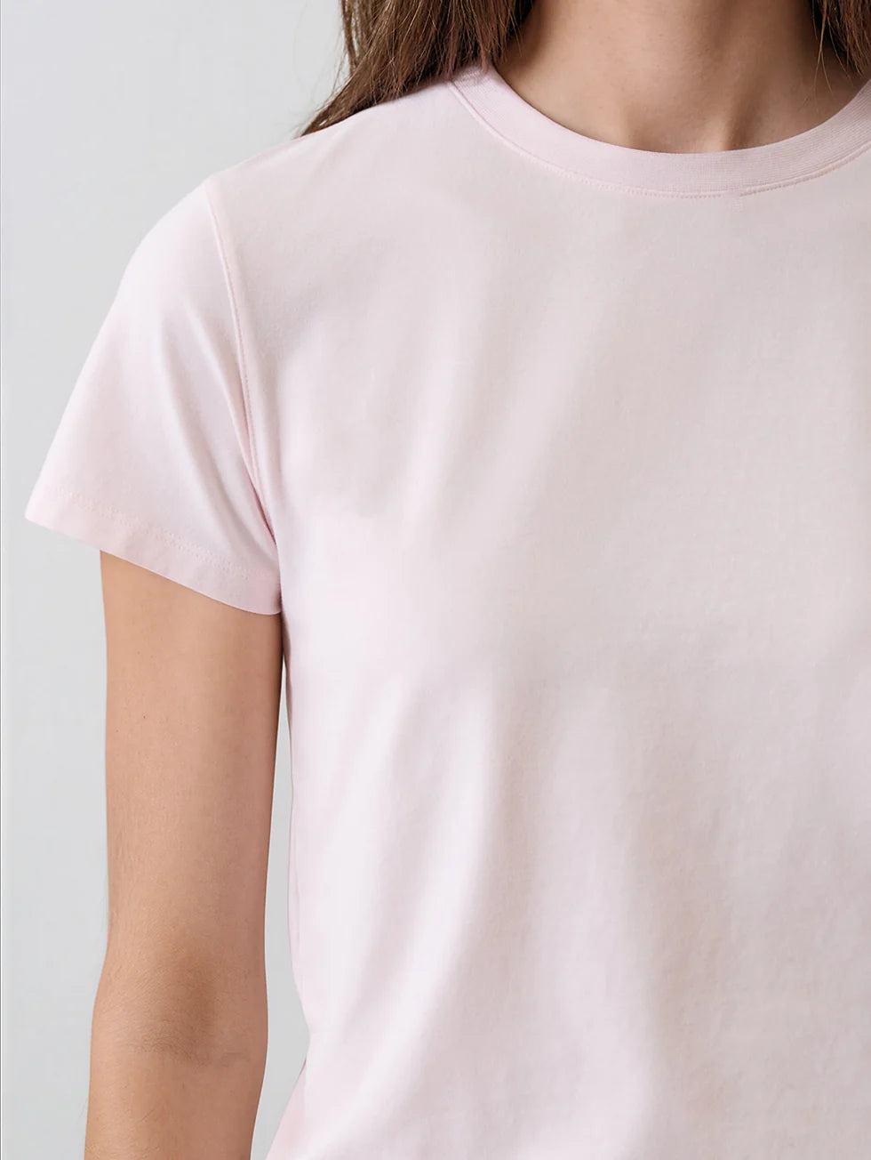Women's light pink fitted crew neck short sleeve t-shirt, plain fabric