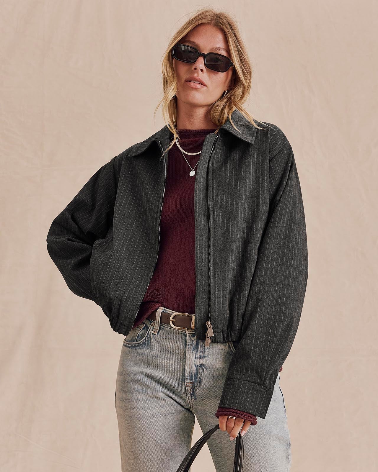 Model wearing Splendid Blake Pinstripe Jacket in charcoal over burgundy sweater and jeans