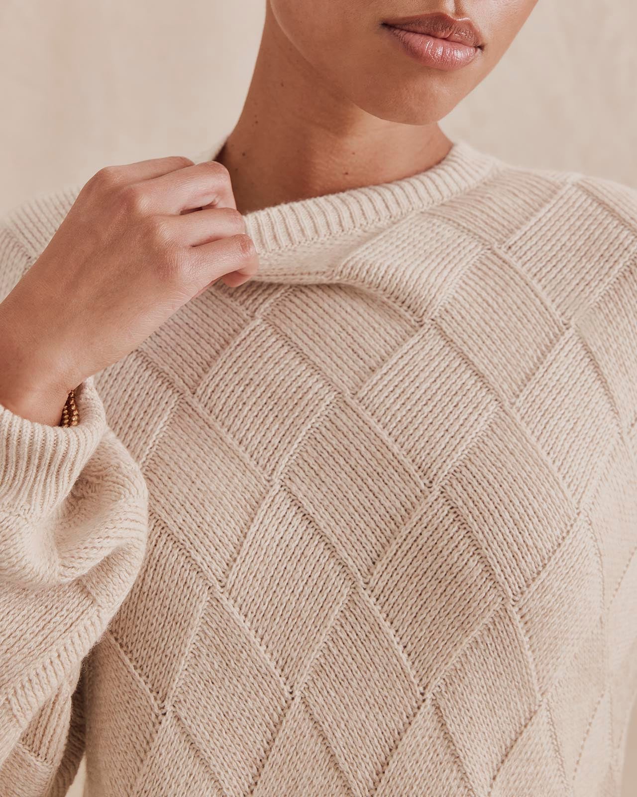 Close-up detail of Splendid Solstice Sweater showing diamond knit texture pattern in wheat heather