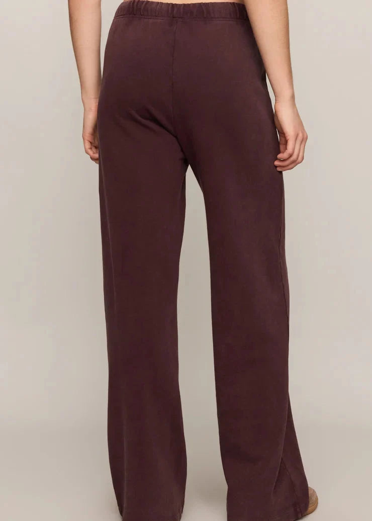 Back view of Z Supply Hunter Knit Pant in Berry Noir dark plum color on model