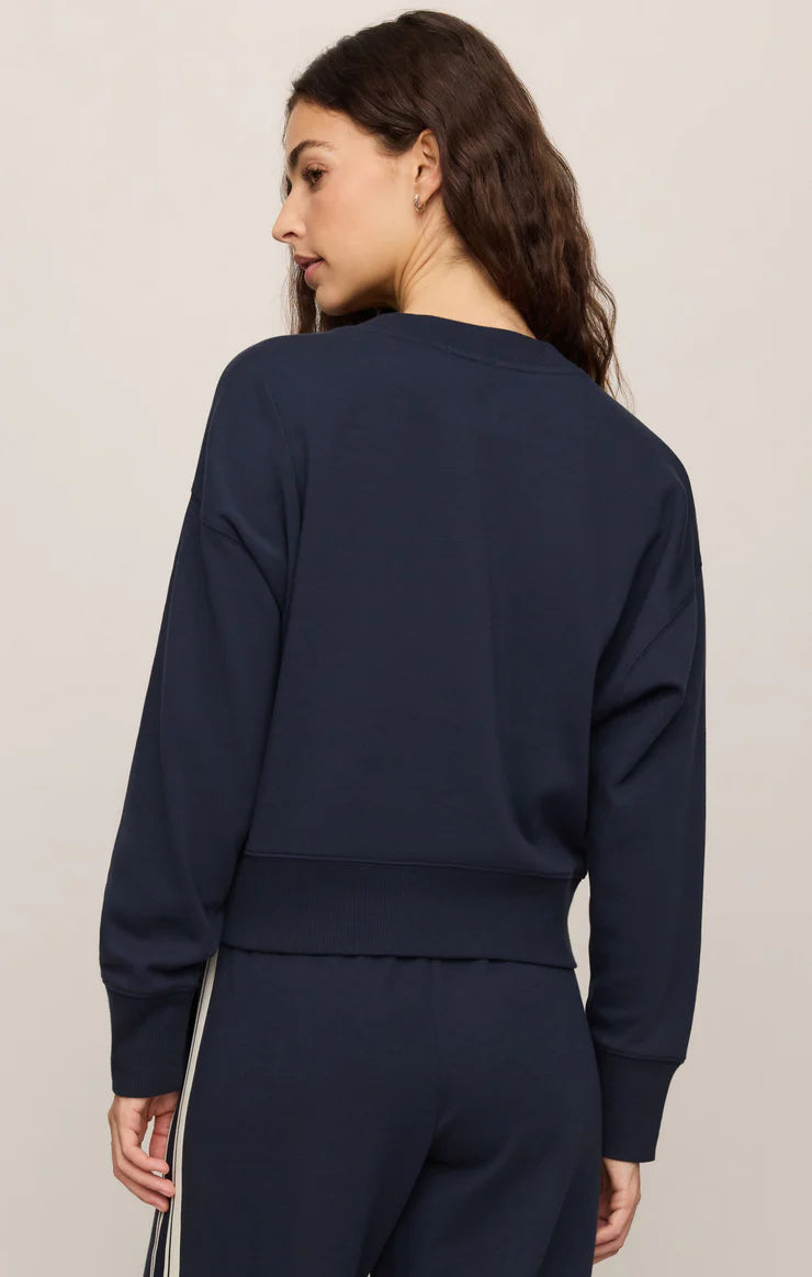 Z Supply Comeback navy blue cropped crewneck sweatshirt, back view, ribbed hem
