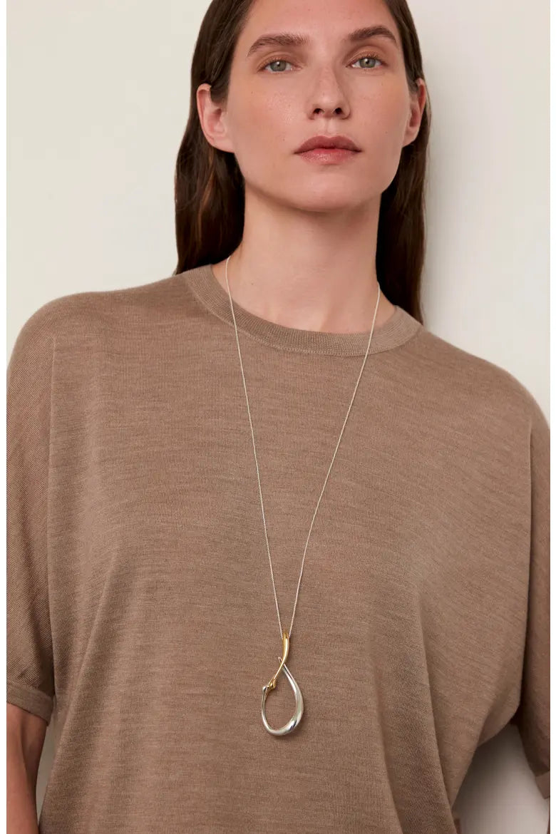 Jenny Bird Large Egret long gold chain necklace with silver abstract pendant