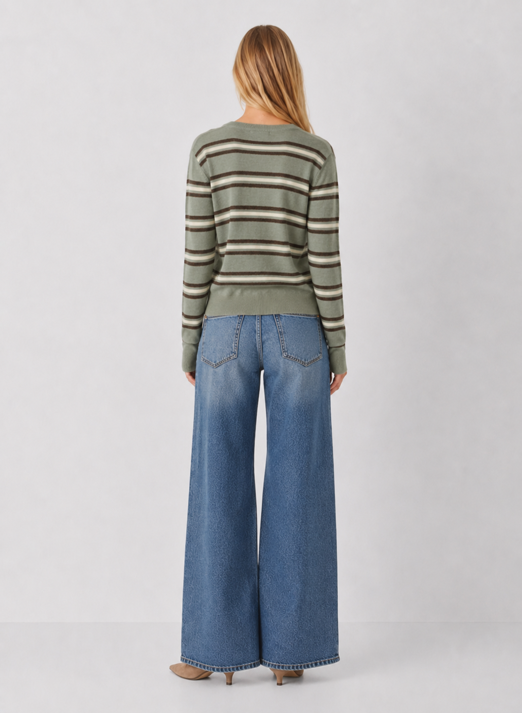 Back view of woman wearing Z Supply Medina Stripe Cardigan in Aqua Cloud with wide-leg jeans