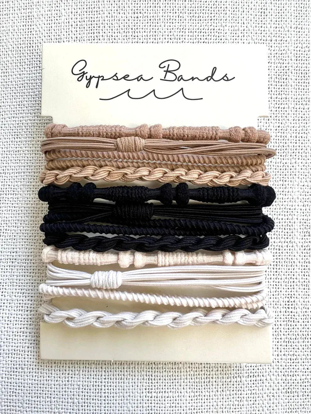 Gypsea Bands Tulum hair tie set in tan, black, and white braided and knotted styles