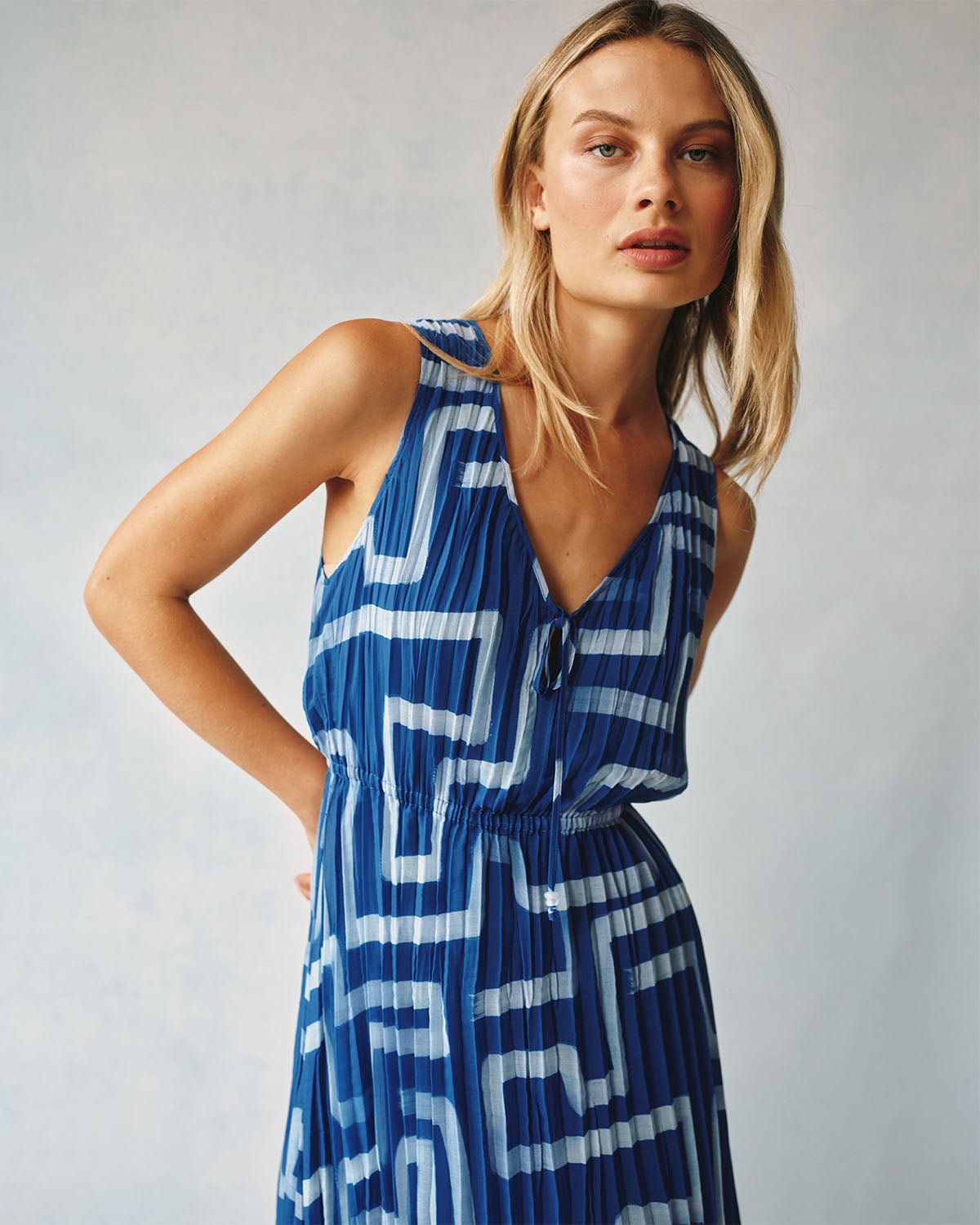 HIGH LOW PLEATED DRESS