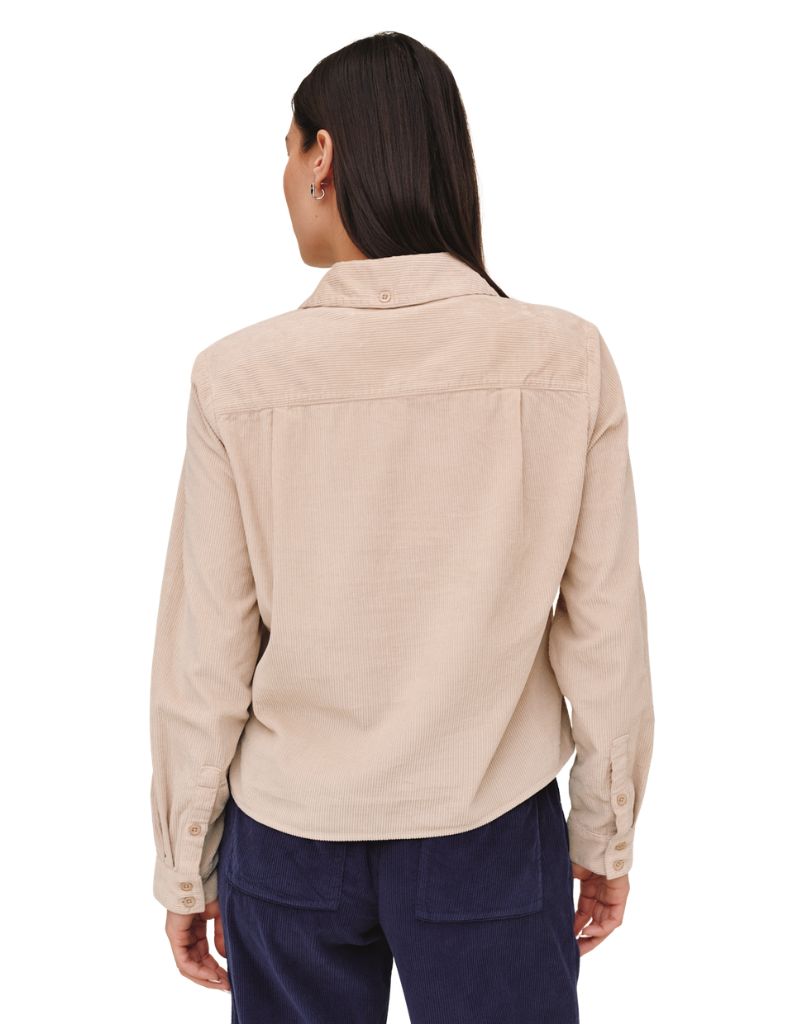 Back view of Bella Dahl long sleeve corduroy work shirt in oat beige on female model