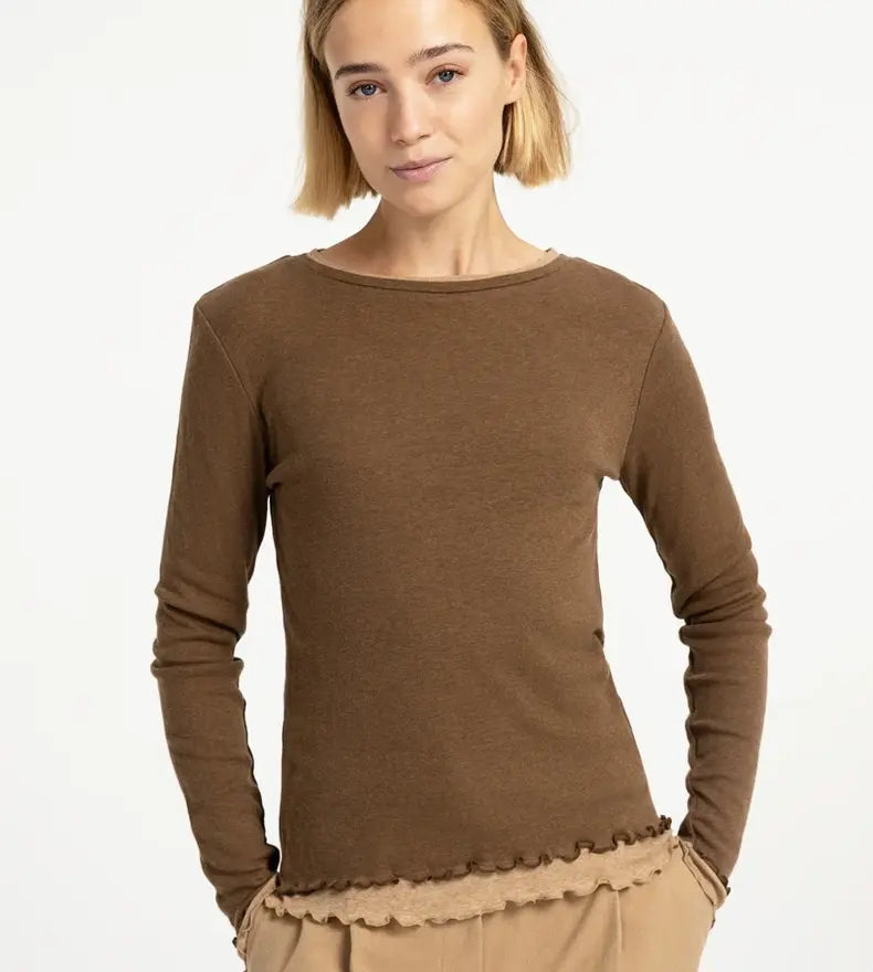 Brown long-sleeve top with double layer ruffle hem detail, fitted silhouette