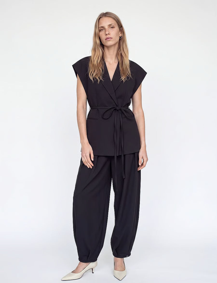 Mos Mosh Lucine Miley black sleeveless wrap vest with tie belt and padded shoulders