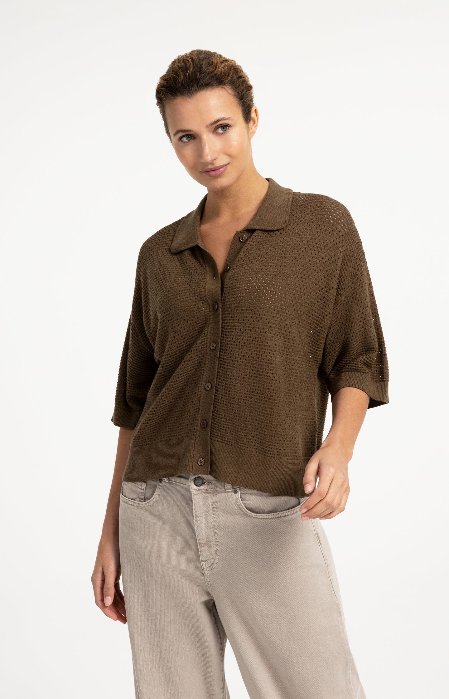 Woman wearing YAYA mesh stitch short-sleeve cardigan in teak brown melange with button front