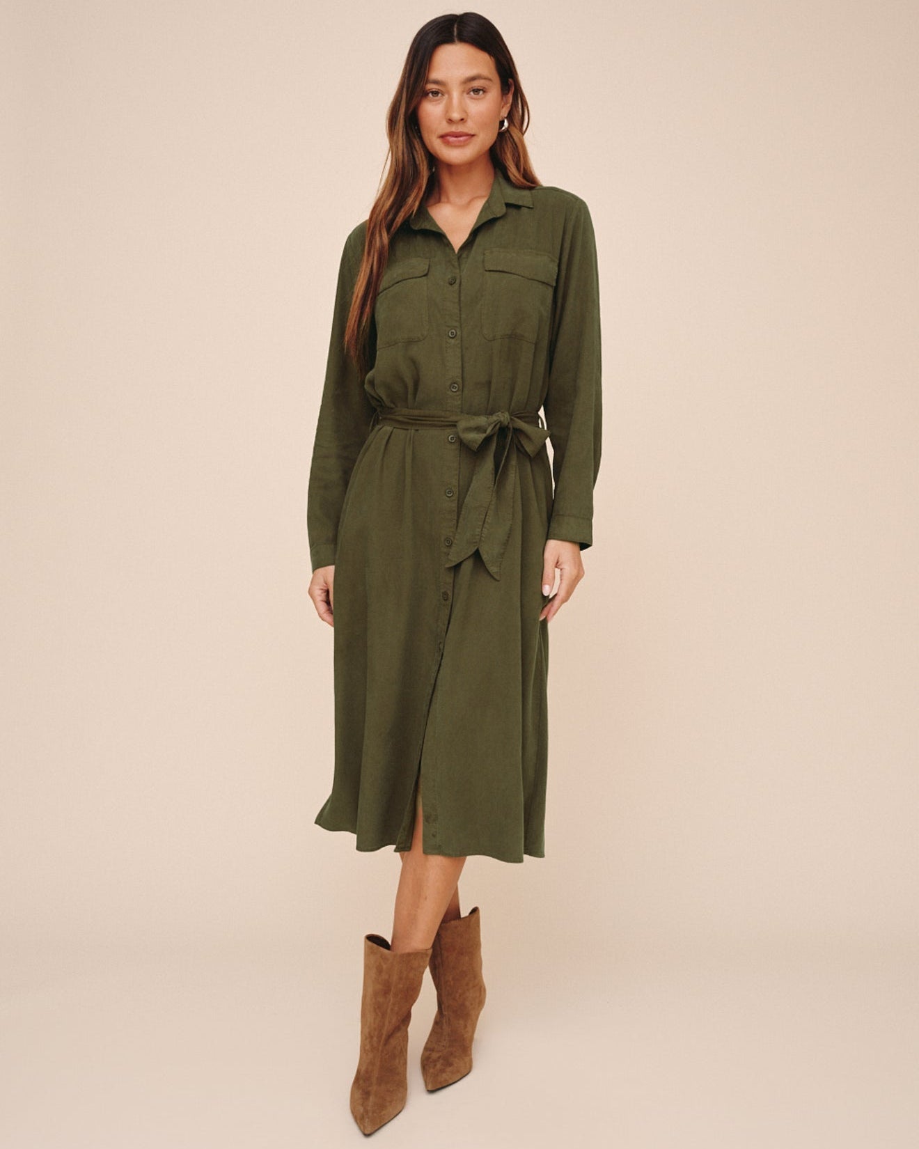 Model wearing Bella Dahl olive green long-sleeve midi shirt dress with belt and brown boots