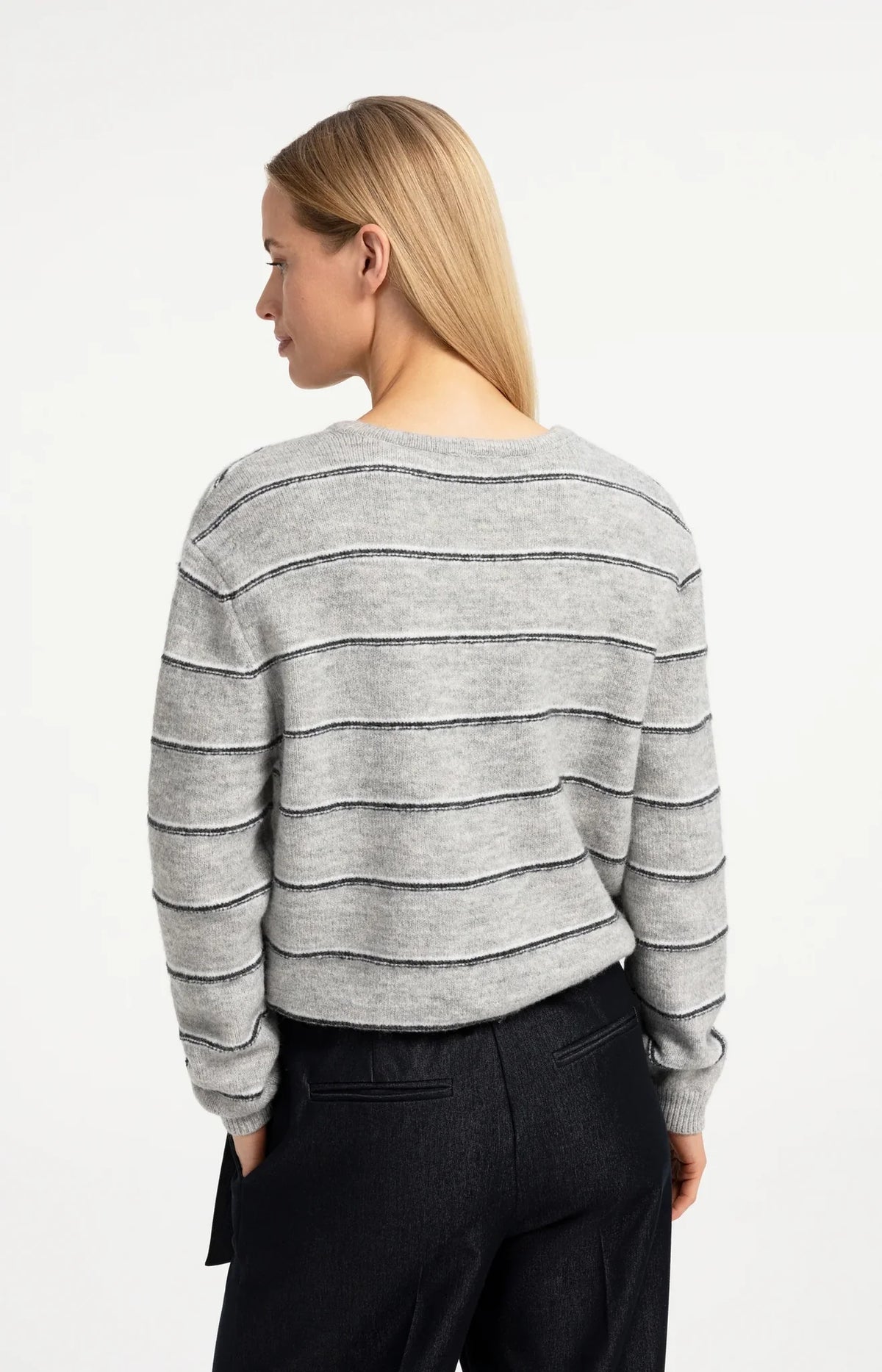 Light grey knitted striped cardigan with long sleeves, back view